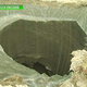 Image for article titled New video of mysterious giant Siberian hole filmed by investigation team